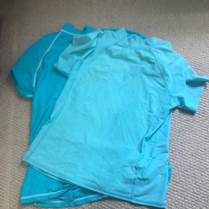 Two rash guards! Light blue: xs dark blue: s